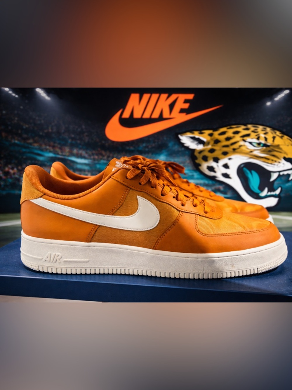 Nike AF 1’s Orange and White Low-Top Sneakers